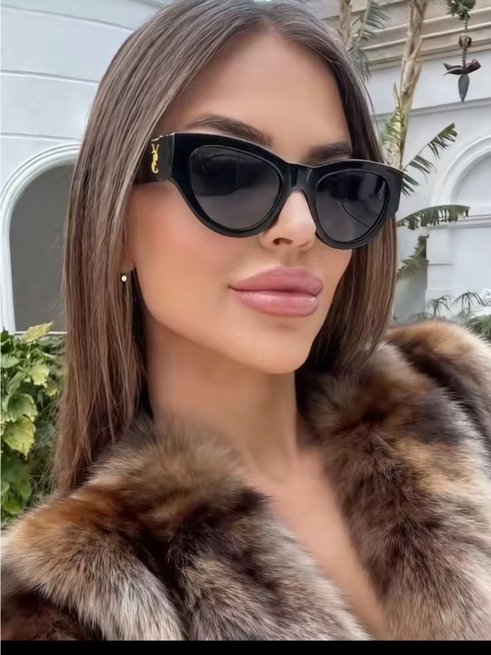 Sleek Black Cat-Eye Sunglasses with Gold Accent